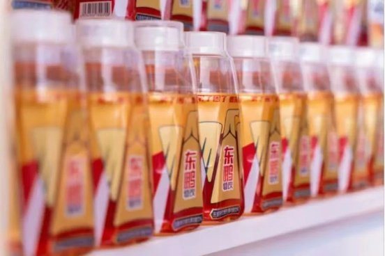 东鹏饮料深耕渠道拓展,营收跨越100亿之后继续冲刺200亿元_九洲国际